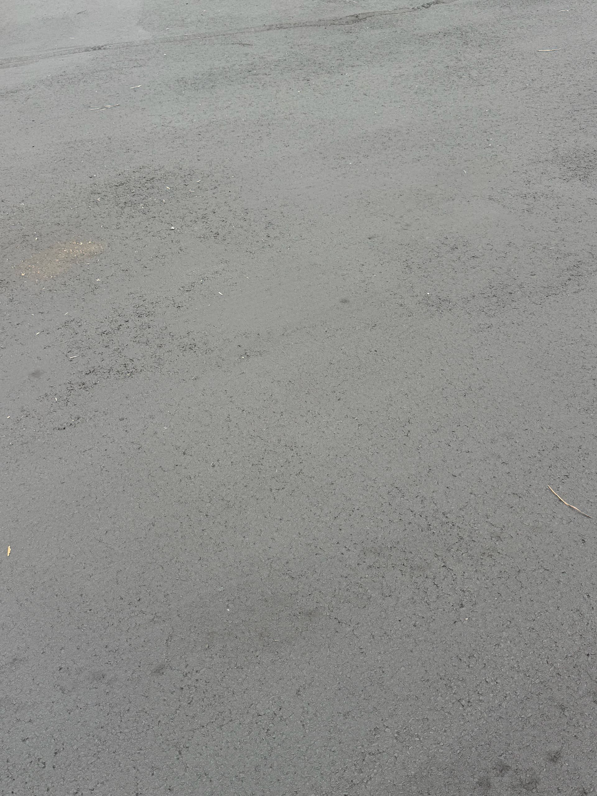 Gallery photos for What Fresh Sealcoating Does for a Cracked Atlanta Parking Lot: Image #1