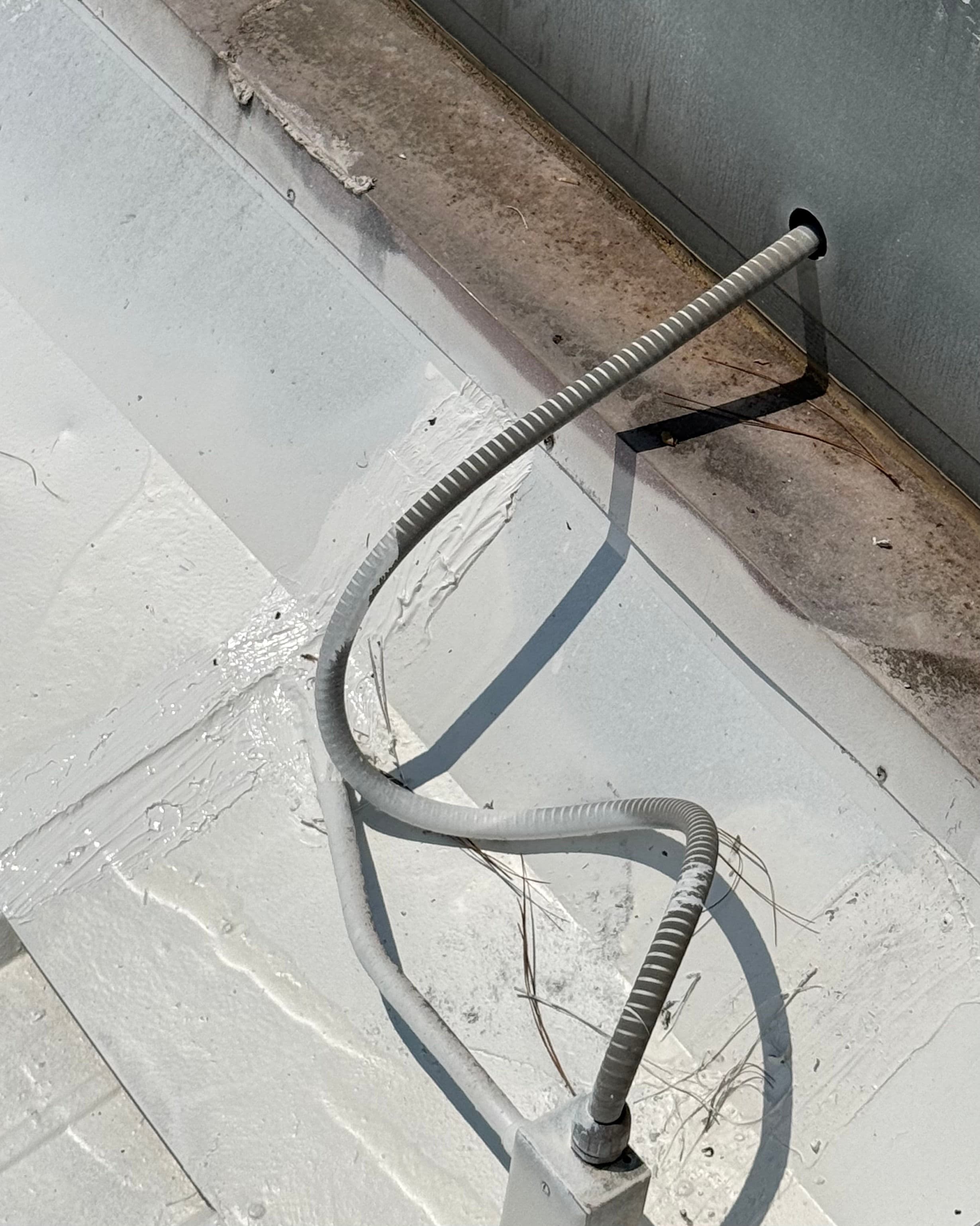 Project Sealing a Roof Penetration on a Commercial Metal Roof image