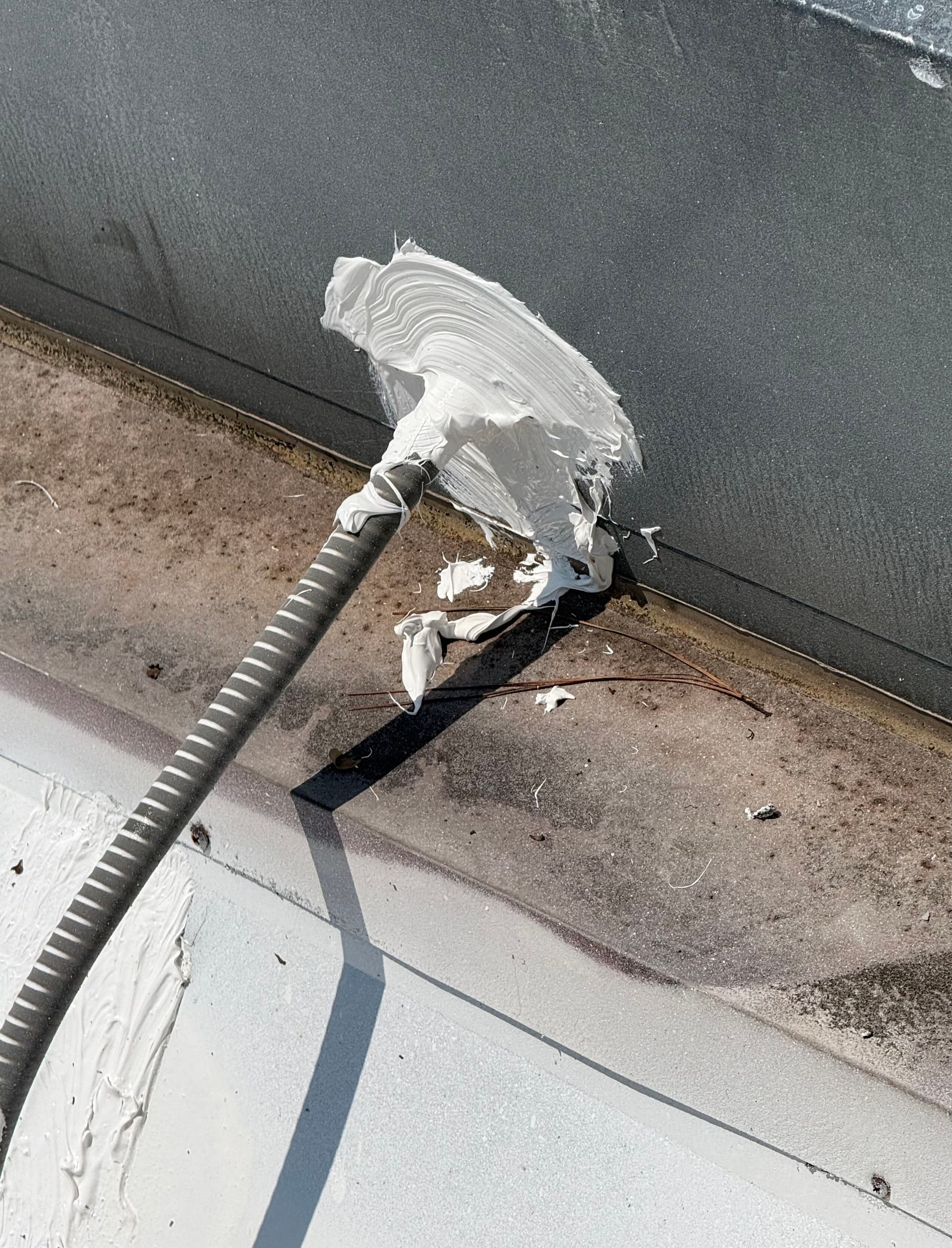 Gallery photos for Sealing a Roof Penetration on a Commercial Metal Roof: Image #1